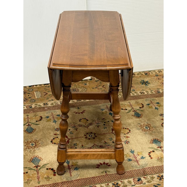 Design Plus Gallery presents a Drop Leaf Side Table from Ethan Allen. This is a reproduction of Colonial American that...