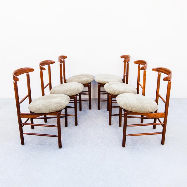 A fully restored set of vintage 1950s mid century modern walnut dining chairs by Greta Grossman for Glenn of California....
