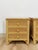 This charming pair of vintage Henry Link wicker 3-drawer nightstands are a warm and practical coastal and Hollywood...
