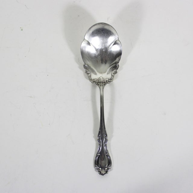 Antique R. Wallace silver plated shell casserole spoon from 1896 in the Joan pattern. Beautiful, ornate and useful size...