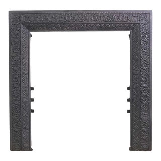 Antique Black Cast Iron Fireplace Frame With Floral & Foliate Detail For Sale