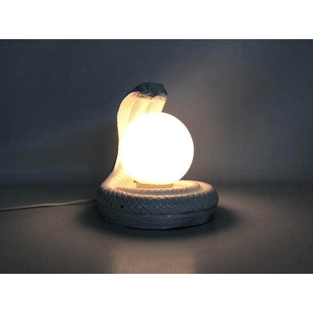 Vintage White Cobra Snake Lamp in Ceramic and opaline globe. 80 years Magnificent Cobra lamp from the 80s in white ceramic...