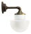 Vintage Industrial White Opaline Glass, Brass, and Cast Iron Sconce For Sale