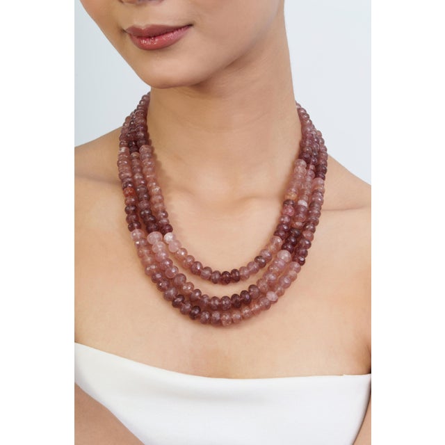 Add a distinctive touch to your jewelry collection with this elegant 18-inch multi-strand necklace, featuring natural...
