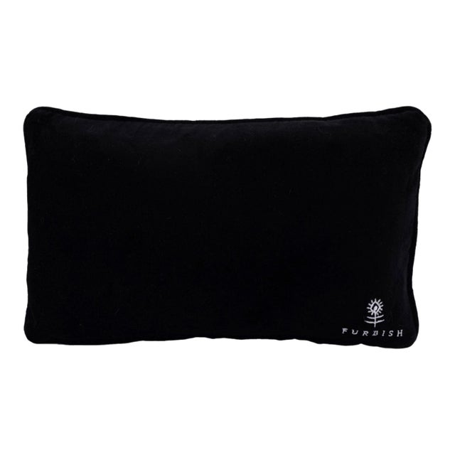 Claim your pet’s favorite spot with this dog-themed needlepoint pillow. Vibrant stitching and soft velvet backing make...