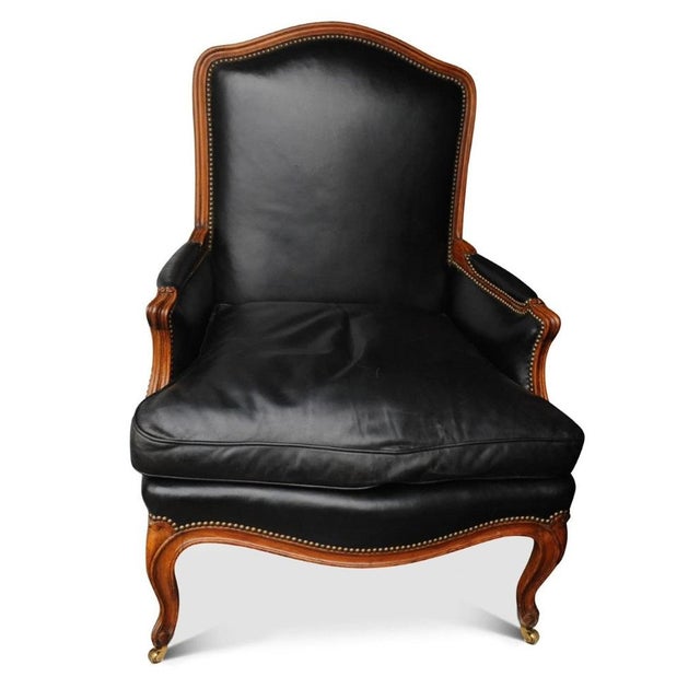 Louis XV French Black Leather Bergere Armchair with Brass Stud Detailing, in Good conditions. Designed before 1890