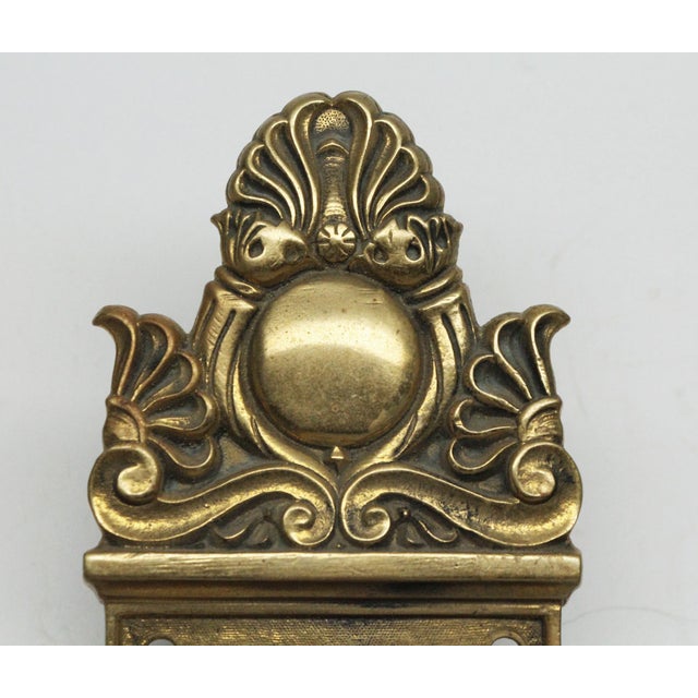 Neoclassical style entry door back plates made of polished brass. Brass door plates inscribed 427. The original mounting...