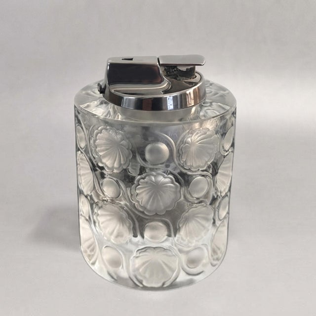 1970s rare lalique french crystal table lighter featuring the coveted "tokyo" pattern. Crafted in france during the 1970s,...