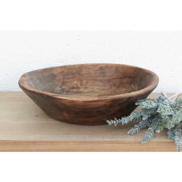 There is a soulful weight to this old wooden bowl that only comes with age. Originally hand-carved and likely used in a...