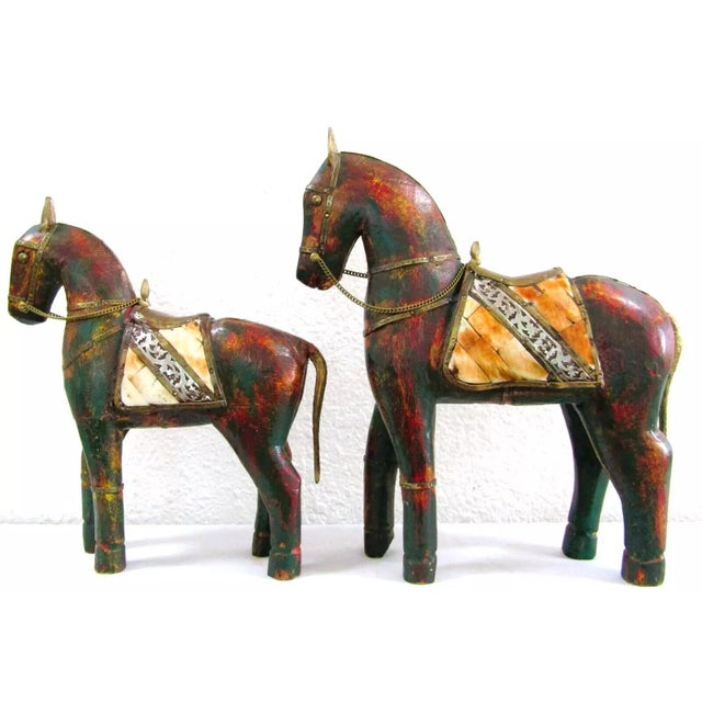 Vintage Pair Tall Solid Wood Carved Horses With Copper and Brass Accents Each is carved in wood with shell and metal...