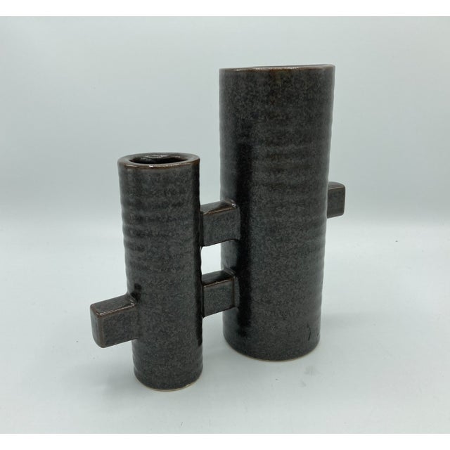 This is a vintage ceramic Ikebana vase with double cylinders and dark brown matte glaze. The vase is on the small size at...