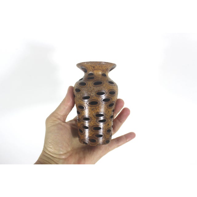 Width: 2.5 inches Height: 4.25 inches This little Banksia nut vase is just stunning. A perfect receptacle for several...