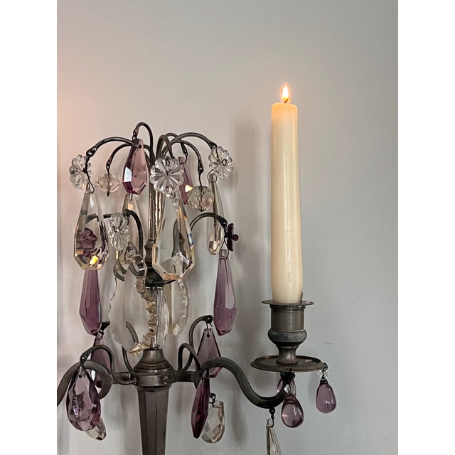 Antique Girándole holds two candles, has all its crystals. Glows beautifully when candles are lit.