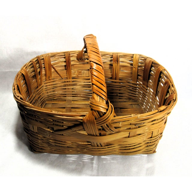 This is a sweet little decorative basket. Nice, but not entirely perfect which is part of it's charm. Nice by itself, also...