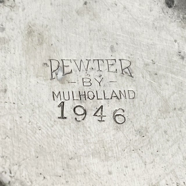 Sip in style with this authentic pewter pitcher set, made by Mulholland in the mid 1940's! The set includes a pitcher with...