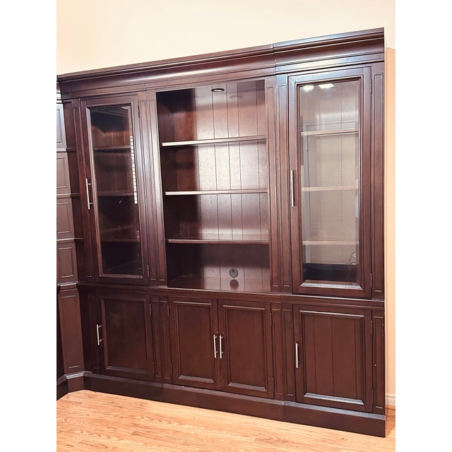 Beautiful dark wood executive library wall unit with glass display cabinets + Desk. Perfect for a home office, study,...