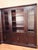 Beautiful dark wood executive library wall unit with glass display cabinets + Desk. Perfect for a home office, study,...