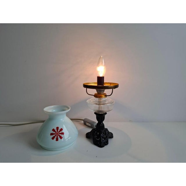 Charming vintage table lamp produced in former czechoslovakia during the 1960s. The lamp is designed in the traditional...