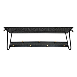 1950s Coat rack in black lacquered metal with perforated sheet metal and brass For Sale