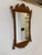 An antique Chippendale style bird’s-eye maple fret-carved wall mounted mirror in a warm honey tone with a rectangular...