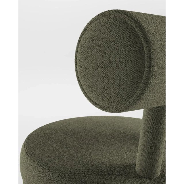 Collector Moca Chair in Boucle Olive by Studio Rig, in New conditions. Designed from 2000