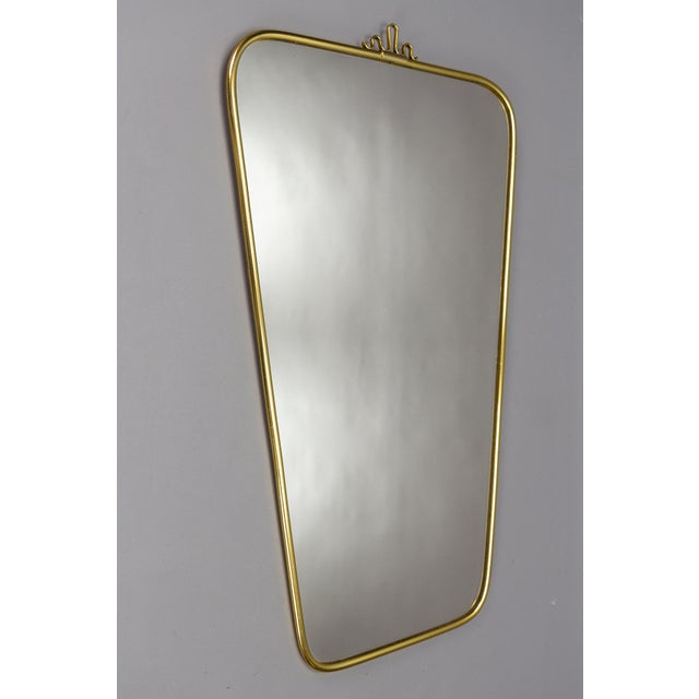 German Mid-Century Modern brass frame wall mirror by Lenzgold, from 1964. An elegant Mid-Century Modern design wall mirror...