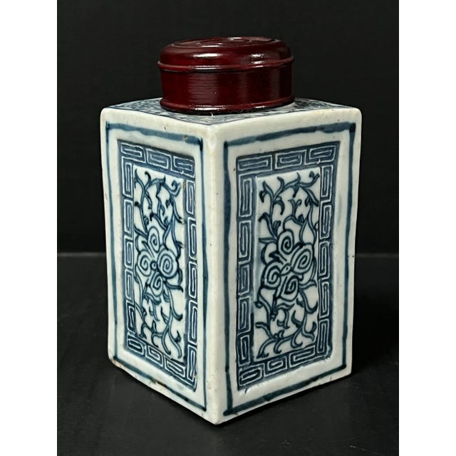 Late 19th Century Chinese Art Blue and White Porcelain Tea Caddy Floral Design with Wooden Cover AGES: Late 19th Century...
