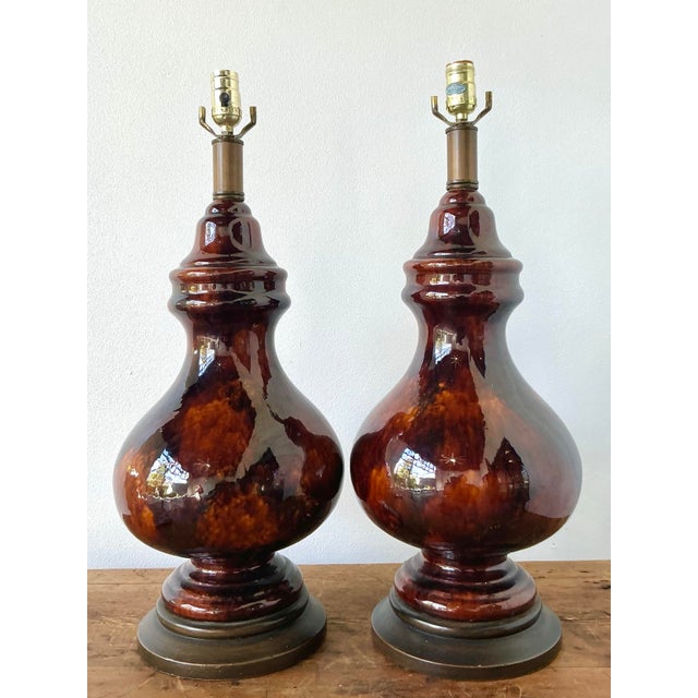 This exquisite pair of vintage ceramic table lamps features a luscious, high-gloss chocolate tortoiseshell glaze that...