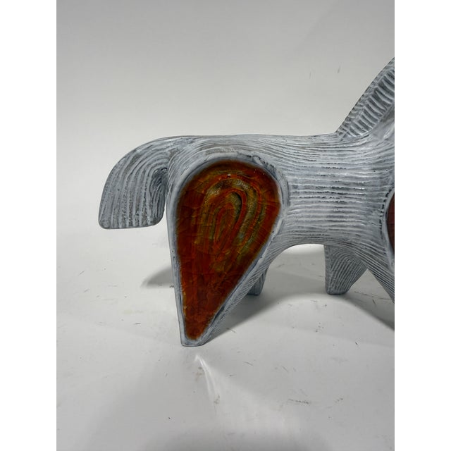 Designed by Jonathan Adler, this sculptural art glass horse from the Menagerie line presents a stylized equine silhouette...