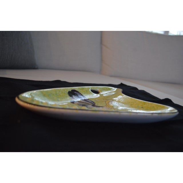 Vintage Mid-Century Modern boomerang ashtray in great condition. This is a rare piece and certainly one of a kind Please...