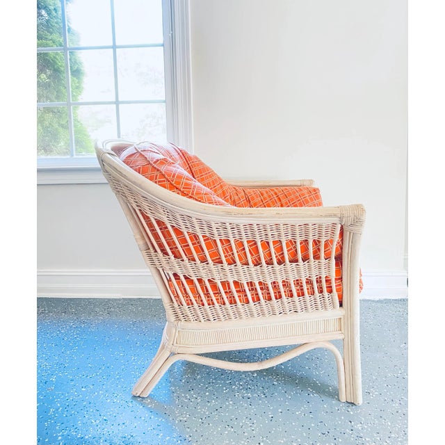 This is a well made, beautiful white rattan lounge chair. The cushion is remade and designed in a such way—cuddling and...