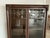 This is a Victorian era bookcase with leaded glass doors from 1930-40. It has 4 shelves. Door has clasp to keep it closed....