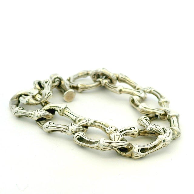Vintage Tiffany & Co. sterling silver bracelet from 1996 featuring a bold bamboo-inspired link design. This is a heavier,...
