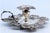 Silver Paddle with Raised Floral Motifs and Resting on Three Feet For Sale - Image 9 of 10