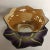 This is a beautiful opalescent purple, yellow, and copper floral design bowl and plate set made in Japan, marked and hand...