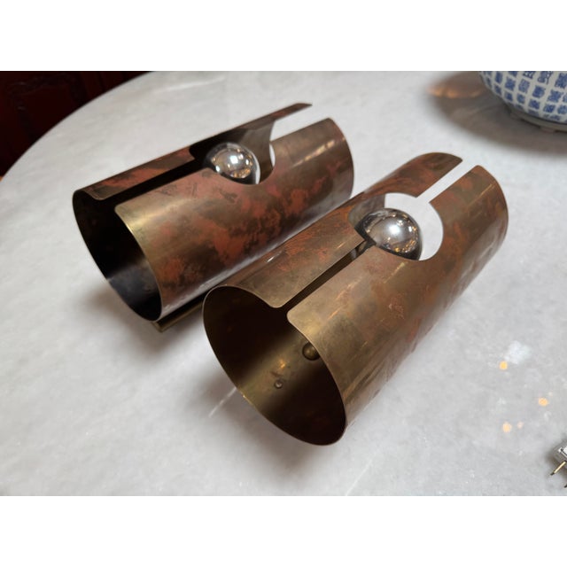 Design Plus Gallery presents a Pair of Eyeball Wall Sconces from the Mid 20th Century. This duo are vintage, heavily...