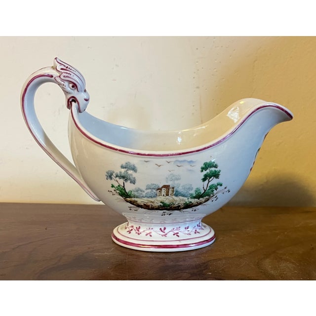 Antique early 19th century Italian Doccia porcelain sauce or gravy boat, circa 1815. Decorated on both sides with a...