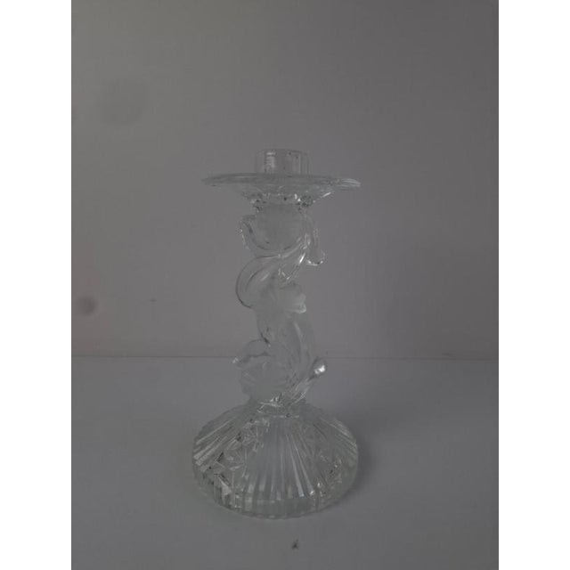 A mid-20th-century cut glass candle holder crafted in Czechoslovakia, showcasing a sculptural form with a deeply textured...