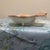 Enhance your collection with this charming mid-century modern ceramic trinket dish, skillfully sculpted in the shape of an...