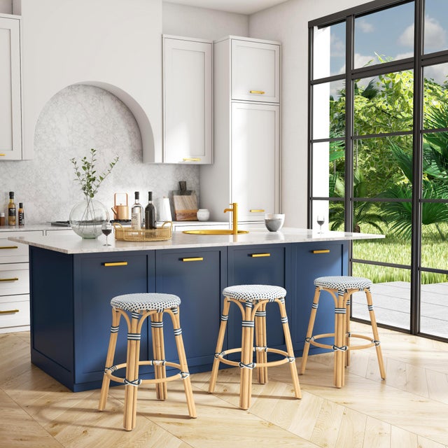 Evoking images of sidewalk tables in the Cote d'Azur, counter stools like this will give your kitchen or patio the casual...