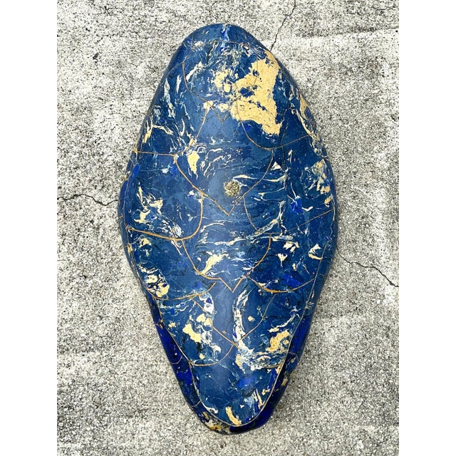 This striking vintage decorative turtle shell showcases the refined artistry of Italian scagliola craftsmanship, a...