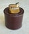 Vintage stitched leather table lighter with great patina. It needs fluid and does not currently light, but it works...