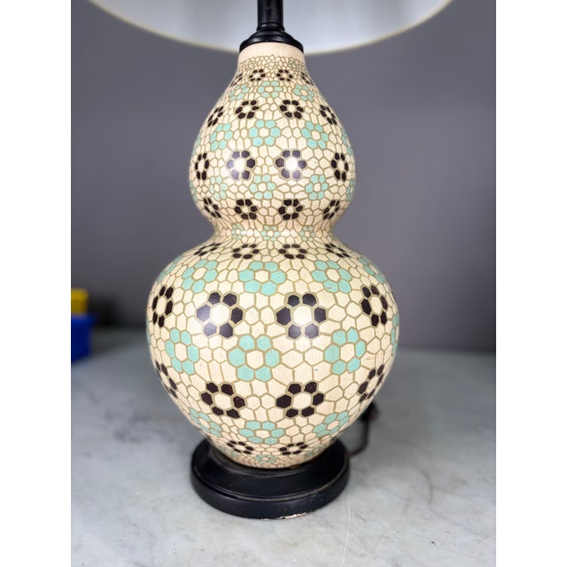 Double Gourd Vase style table lamp in Cream, with a mosaic repeating flower pattern of black and light blue. Corded...