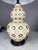 Double Gourd Vase style table lamp in Cream, with a mosaic repeating flower pattern of black and light blue. Corded...