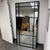 Design Plus Gallery presents the Spurgeon Leaner Mirror by Uttermost. This oversized rectangular mirror is framed in black...