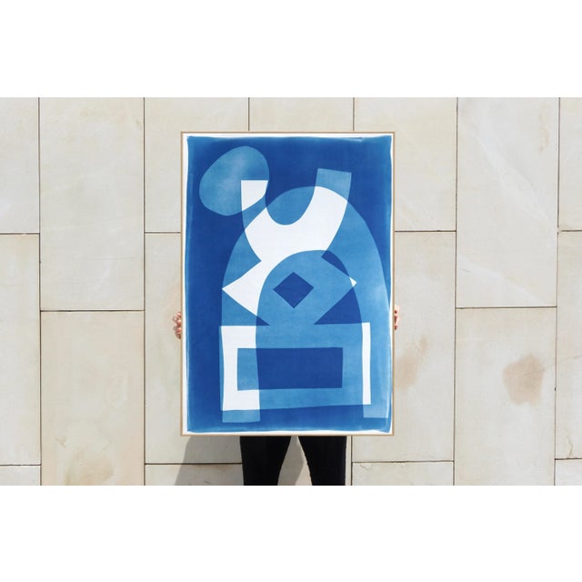This is an exclusive handprinted unique cyanotype that takes its inspiration from the mid-century modern shapes and the...