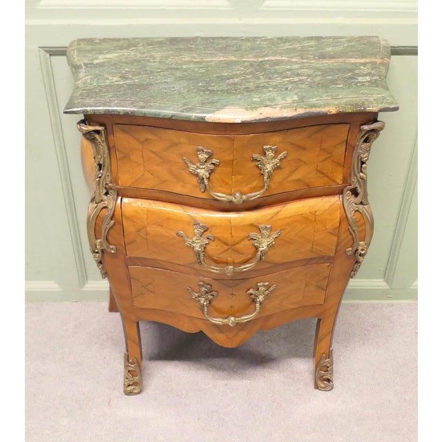 Petite French Louis XV Style Bombe Commode, Chest of Drawers This Walnut Marquetry Chest is a very rare piece, it has the...