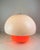 Large Italian table lamp made of an orange glass base with a white acrylic lampshade on top. Each of them can be lit...