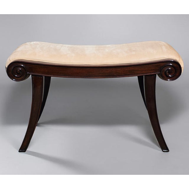 Elegant and timeless, this Kerry Joyce For Dessin Fournir Regency Style Mahogany Scroll-End Upholstered Bench draws...