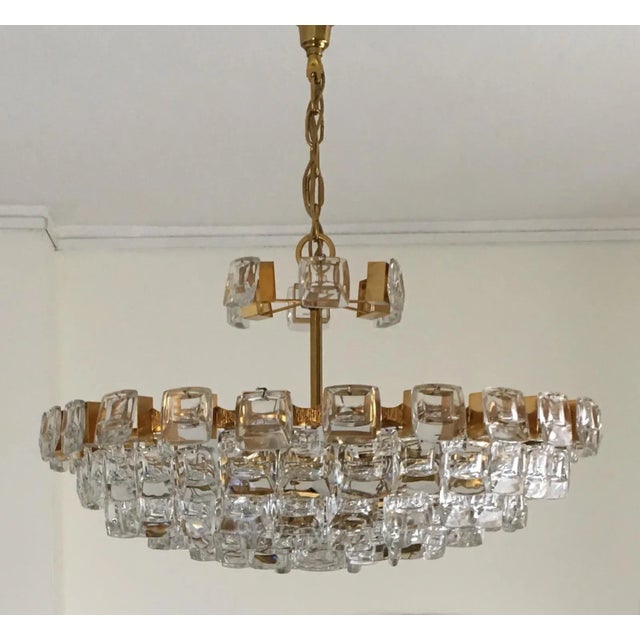 This chandelier made of gold-plated brass was produced in various sizes, this is the very large version with a diameter of...